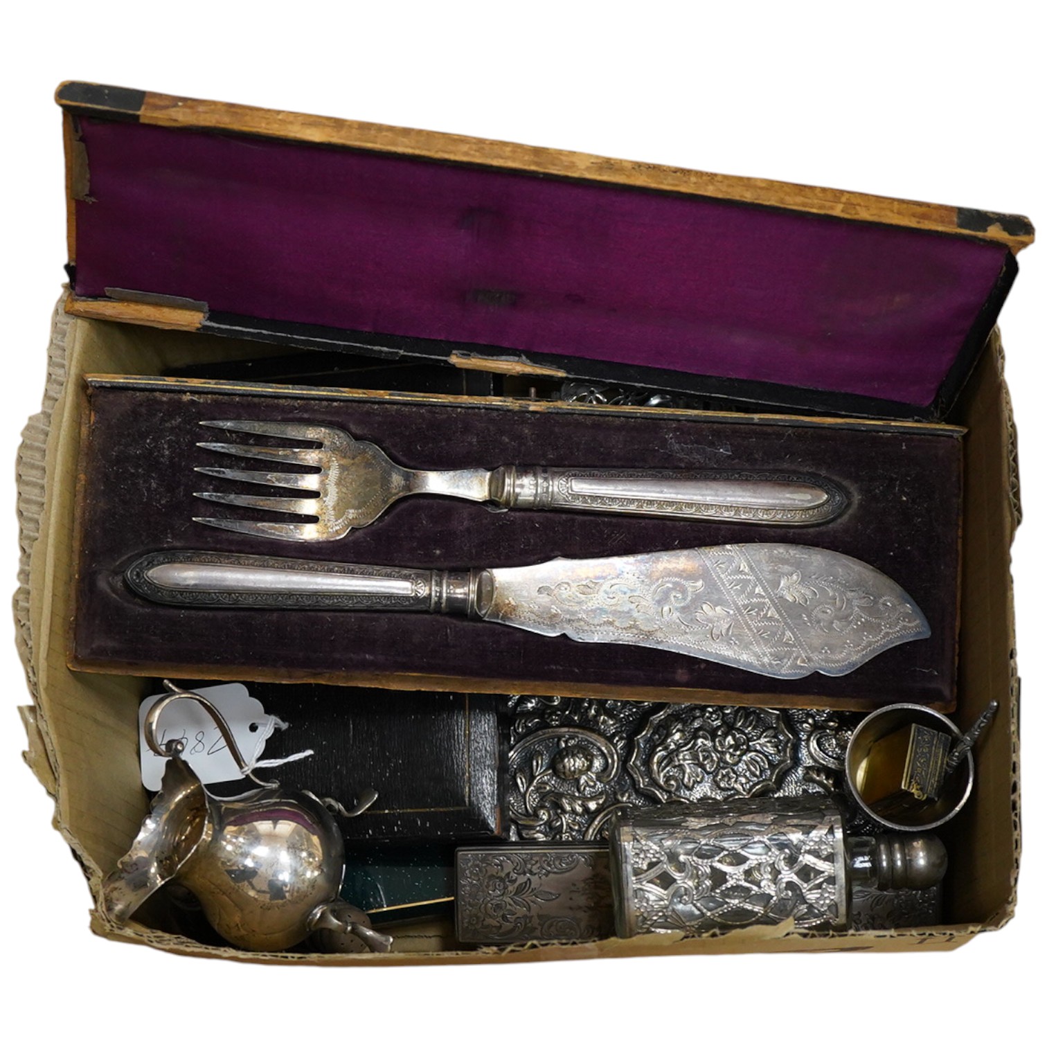 A group of small silver and white metal items including a late Victorian silver cream jug, a late Victorian silver mounted hand mirror, two continental 900 standard mounted small wall mirrors, a modern miniature silver t